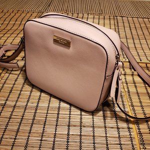 Pink Kate Spade crossbody Camera style bag.